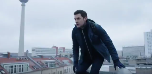 Daniel Miller (Richard Armitage) stands on a rooftop in the teaser trailer from Berlin Station. My cap.